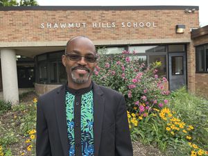 Education changed his life as a refugee. Now, this Grand Rapids principal is helping students thrive