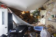 The interior of a mobile home damaged by a fallen tree at the Pavilion Mobile Home Park along Alpine Avenue NW in Kent County, Michigan on Friday, Aug. 25, 2023. A strong storm cell came through the region Thursday evening. (Joel Bissell | MLive.com)