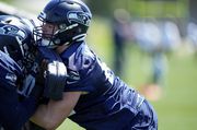 Seattle Seahawks center Alex Mollette (62) participates in a blocking drill during the NFL football team's rookie minicamp, Friday, May 12, 2023, in Renton, Wash. (AP Photo/Lindsey Wasson)