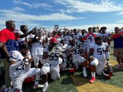 The Southfield A&T football team celebrates its 29-27 win over Detroit Cass Tech at the Xenith Prep Kickoff Classic on Aug. 26, 2023 at Wayne State's Tom Adams Field.
