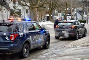 An Ann Arbor police officer stops a motorist on Seventh Street on Feb. 12, 2022.