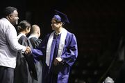Andy Garcia walks the stage at Loy Norrix High School graduation at Wings Event Center in Kalamazoo, Michigan on Wednesday, May 31, 2023. Garcia and his classmates were born the year the Kalamazoo Promise was established. (Rodney Coleman-Robinson | MLive.com)
