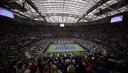 FILE - A fourth round match is played under the roof of Arthur Ashe Stadium during the U.S. Open tennis championships Monday, Sept. 2, 2019, in New York. Play at the 2023 U.S. Open begins at Flushing Meadows on Aug. 28, with Iga Swiatek and Carlos Alcaraz as the defending champions. (AP Photo/Frank Franklin II, File)